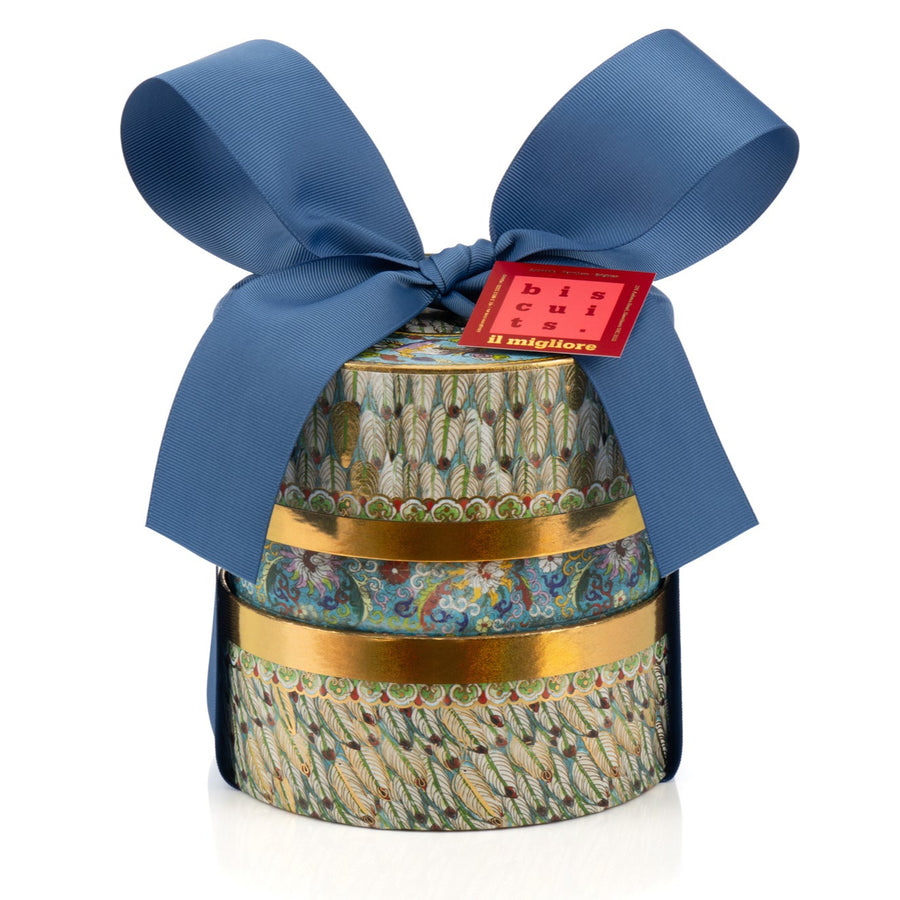 Decorative box with delicious biscuits and a blue ribbon on a white background