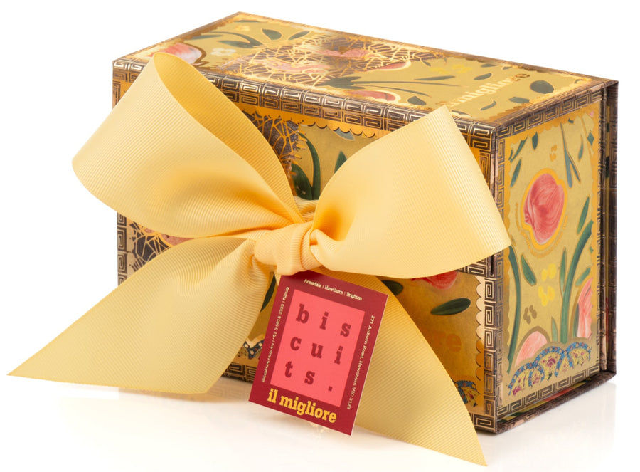 Gift box with a decorative bow and floral design on a white background