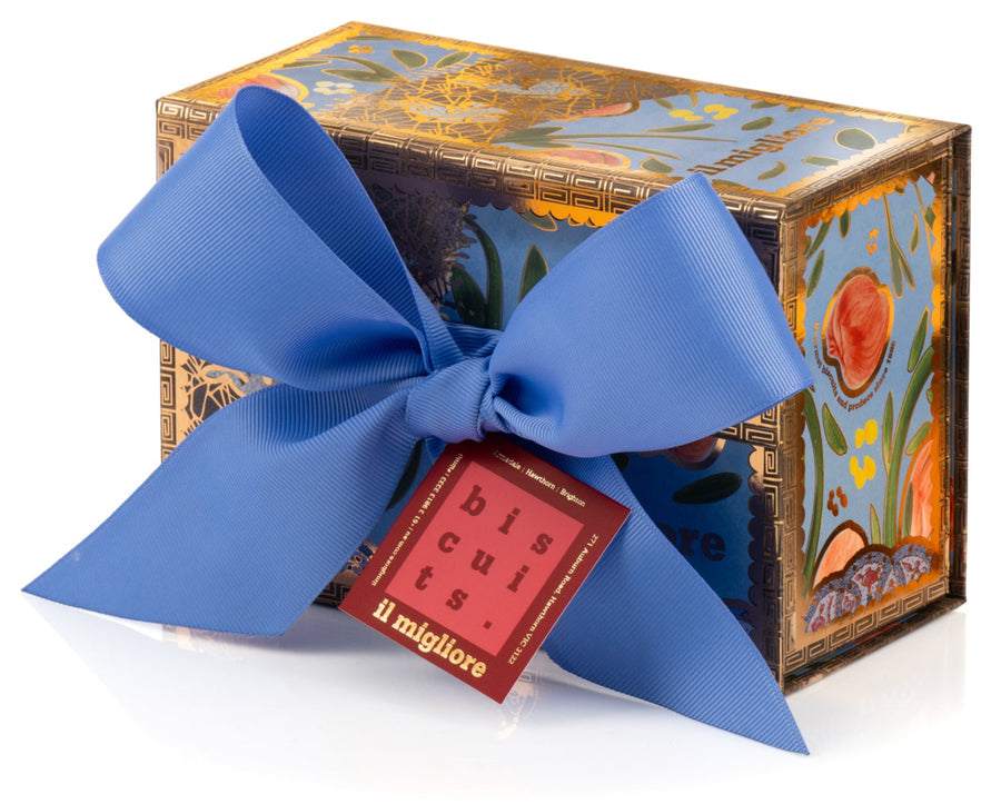 Decorative box with a blue ribbon and a red tag on a white background