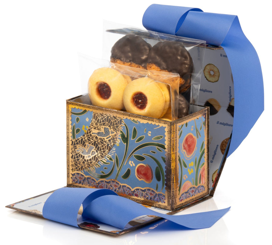 Decorative box with biscuits and a blue ribbon on a white background