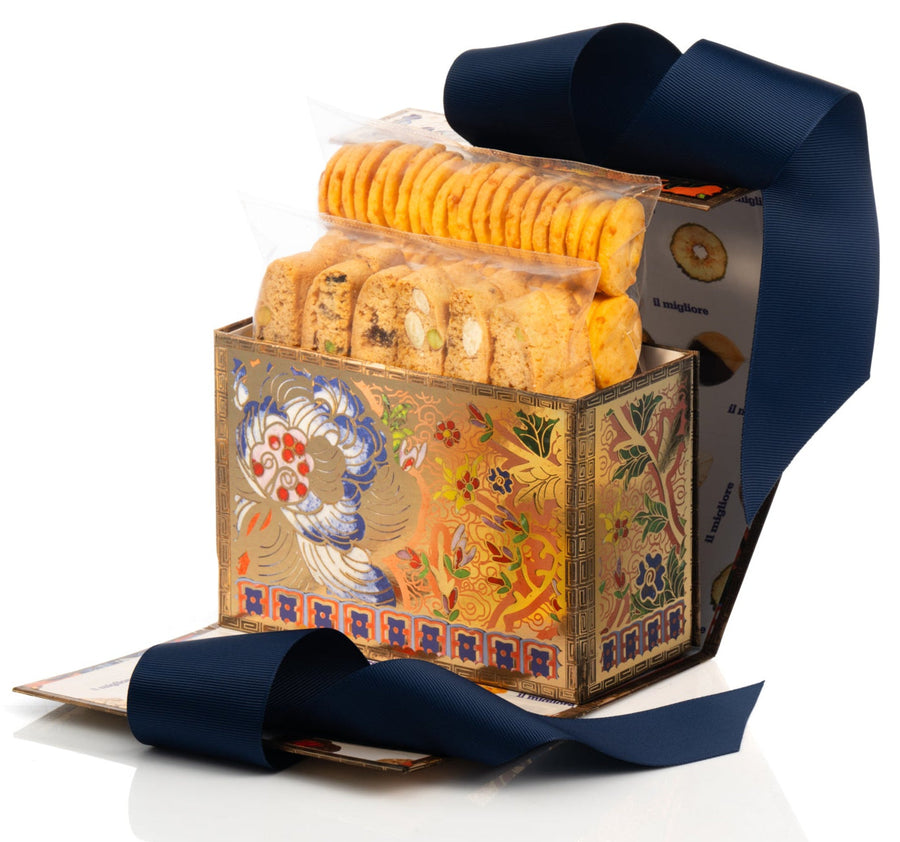 Decorative box with cookies and a blue ribbon on a white background