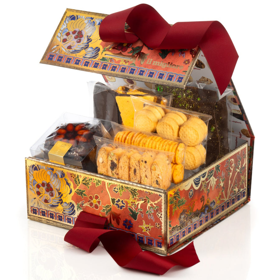 red gift box with delicious biscuits and a red ribbon