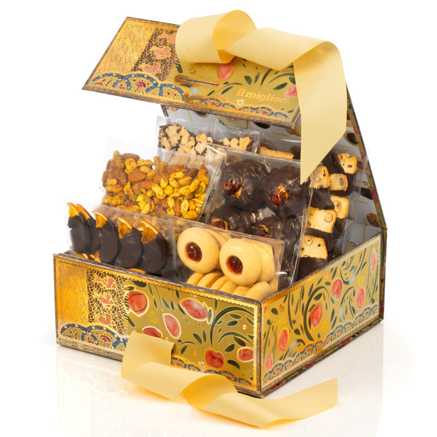 Decorative gift box with assorted cookies on a white background