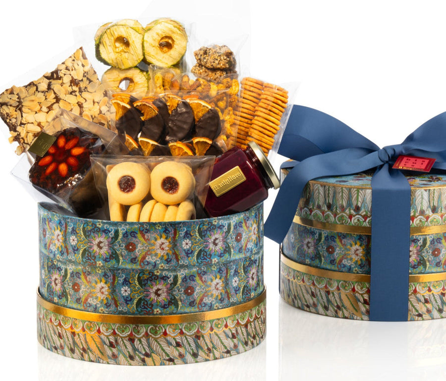 Beautiful gift box packed with delicious biscuits and sealed with a blue bow
