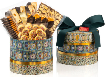 beautiful round gift box with delicious biscuits and a green bow