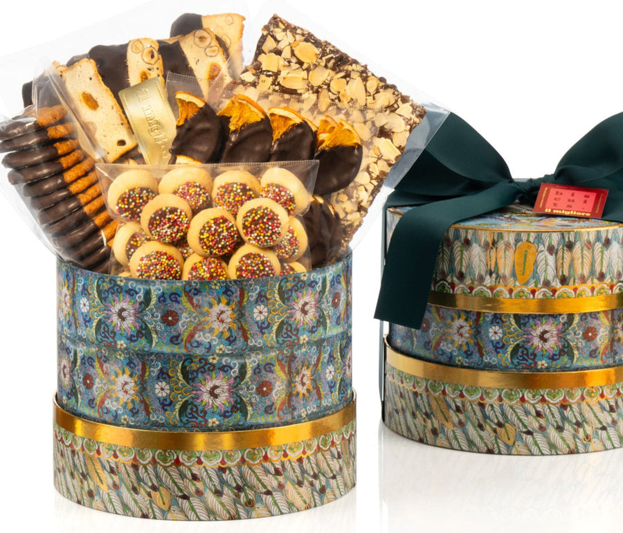 beautiful round gift box with delicious biscuits and a green bow