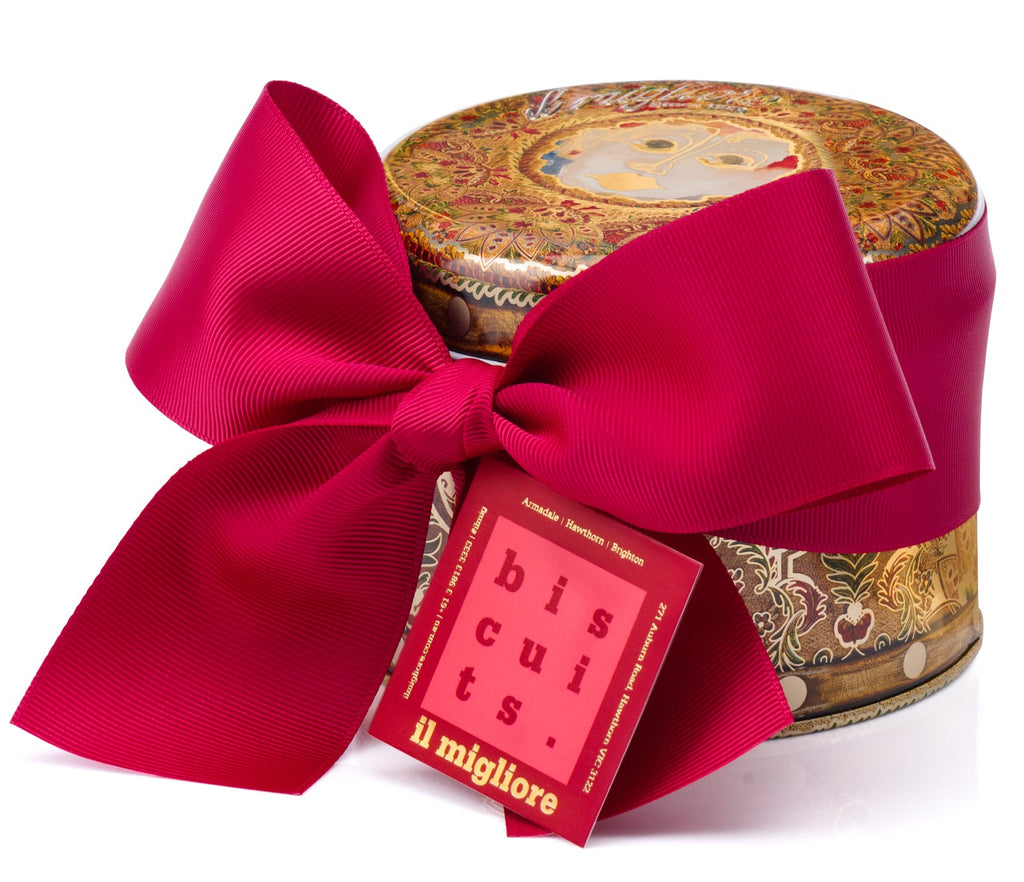 A stunning antique florentine pattern tin with a beautiful bow and delicious biscuits 