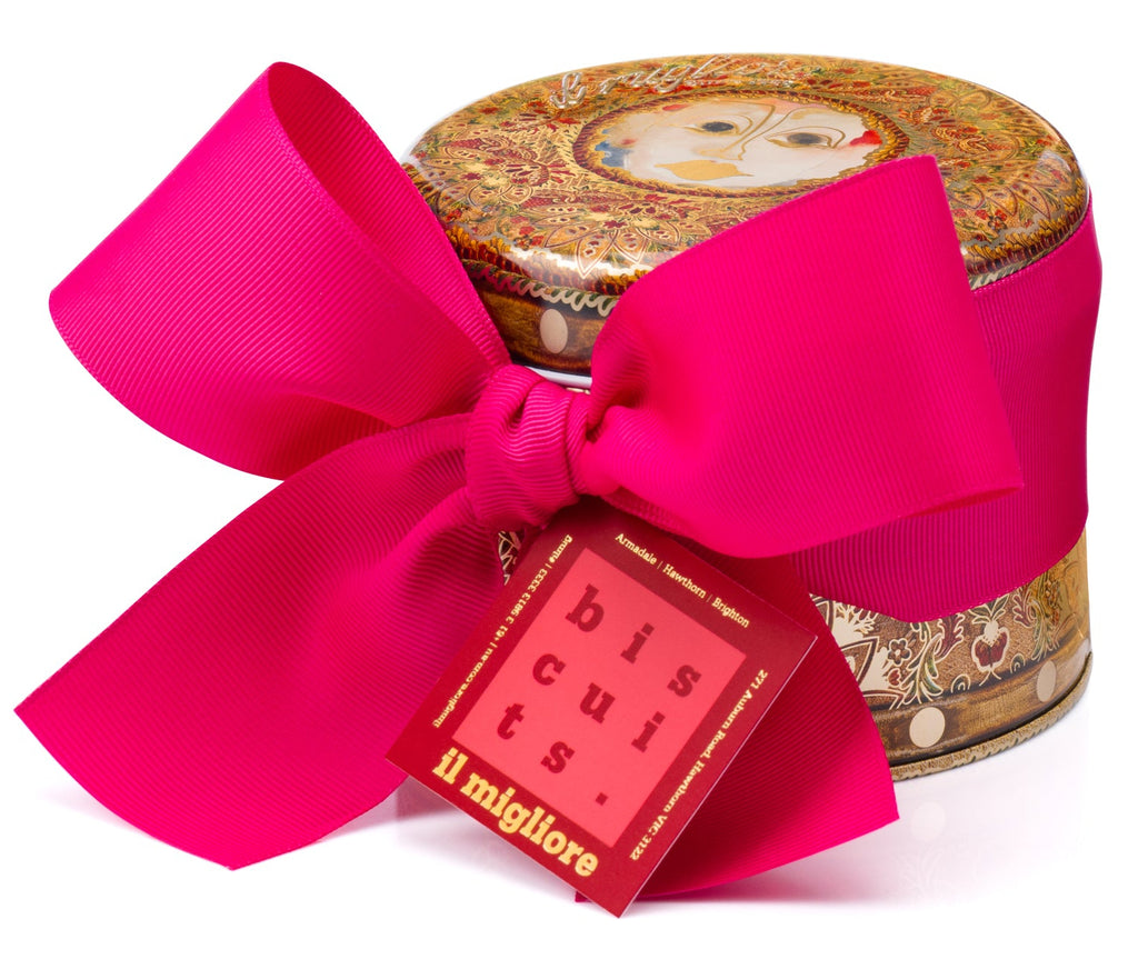 A stunning antique florentine pattern tin with a beautiful bow and delicious biscuits 
