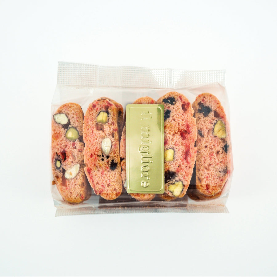 Packaged cookies with a gold label on a white background